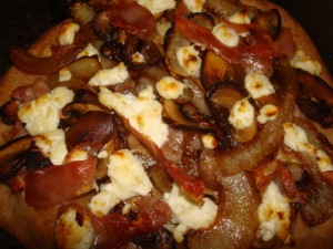 Caramelized Onion, Goat Cheese and Prosciutto Pizza
